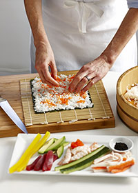 Nori sheet, rice and tobiko or sesame seeds