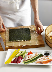 Turn over sushi rice and nori sheet