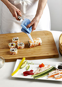 Slicing a Sushi roll
