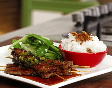 Honey and Soy Sticky Skewers on Asian Greens